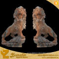 sunset red western stone marble lion statues